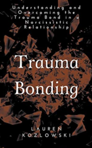 A black and brown background with the words trauma bonding