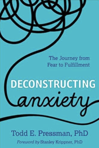 A book cover with the title deconstructing anxiety.